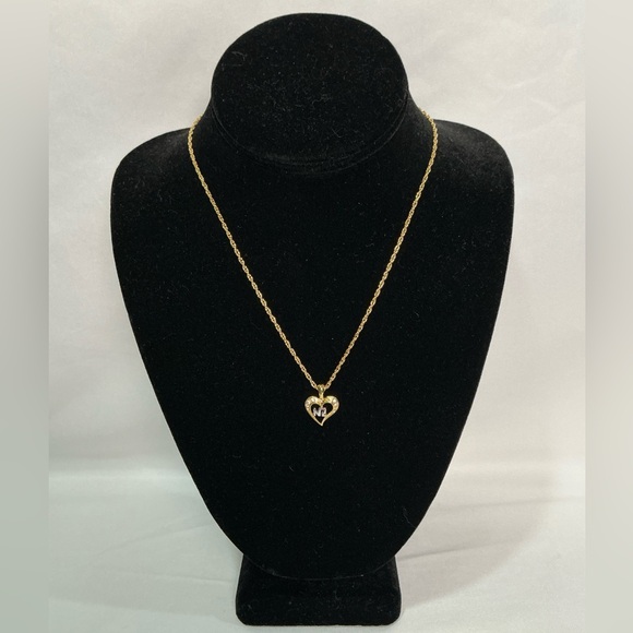 Nina Ricci Jewelry - Vintage Nina Ricci Rhinestone Gold Silver  Heart Pendant Necklace
